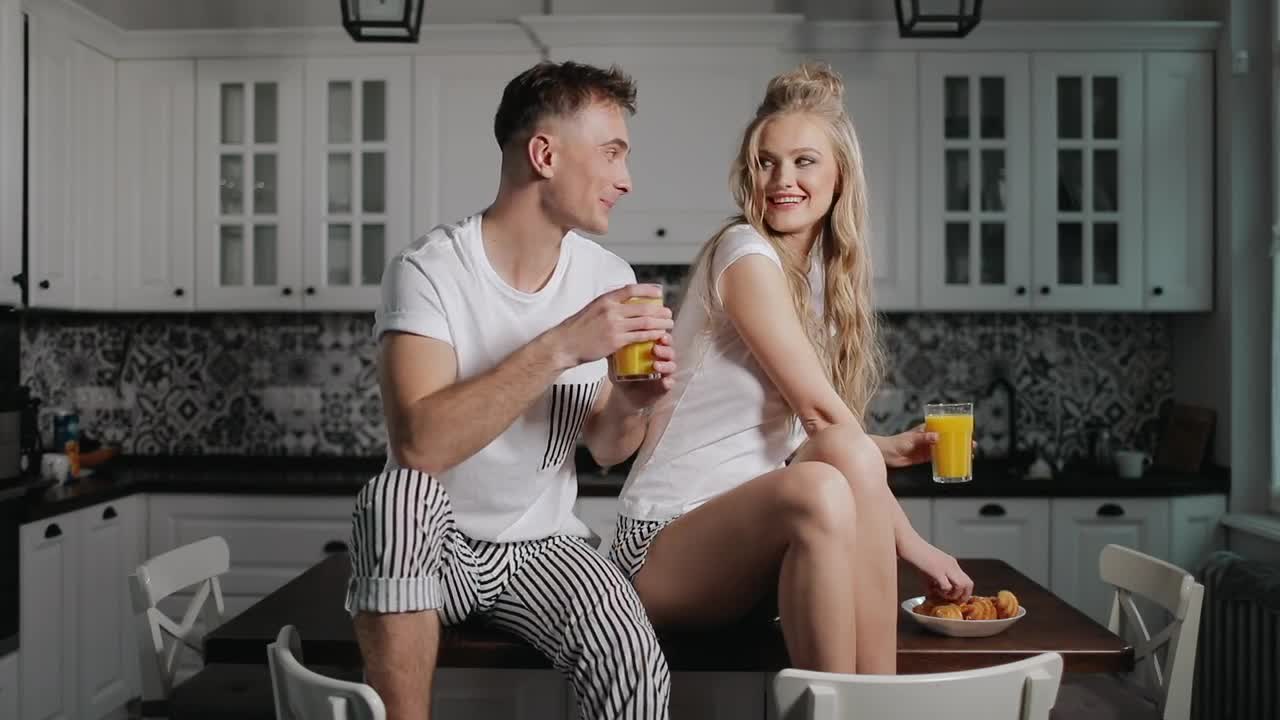 Stock Video Happy Young Couple Enjoy Romantic Midnight Snacks Animated Wallpaper - Free Download