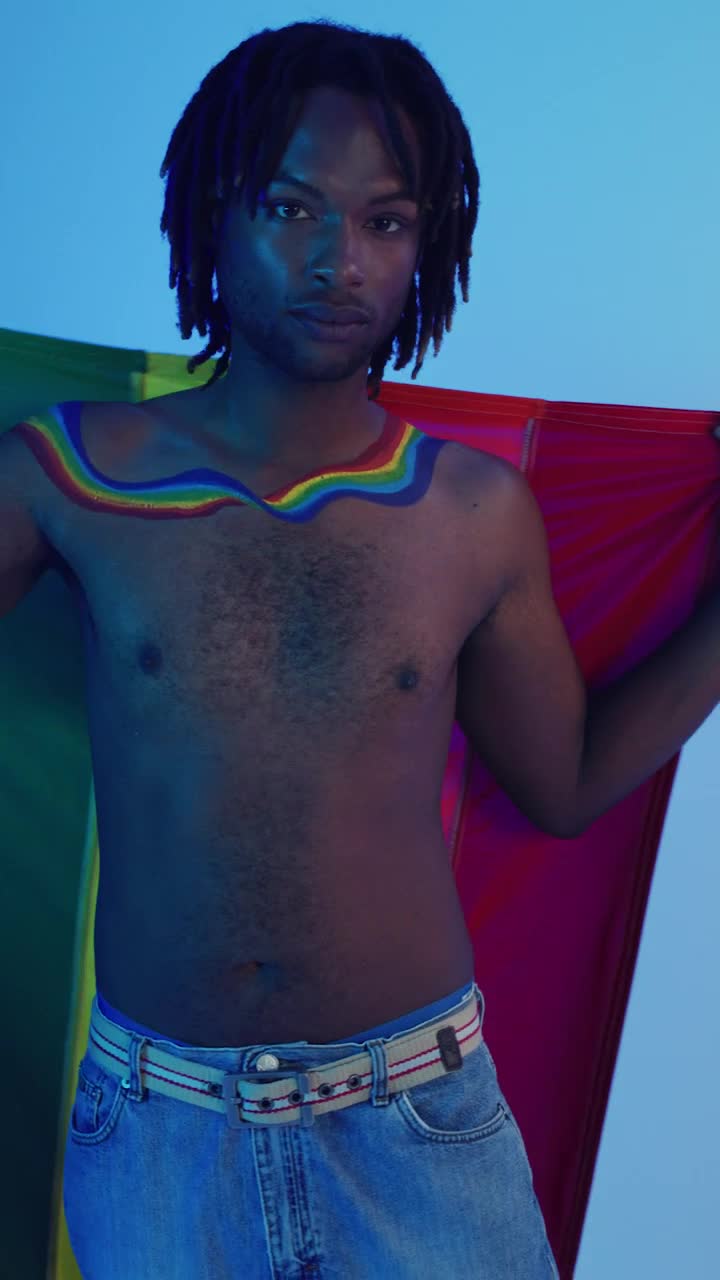 Stock Video Lgbt Man Playing With Lgbt Pride Flag Animated Wallpaper - Free Download