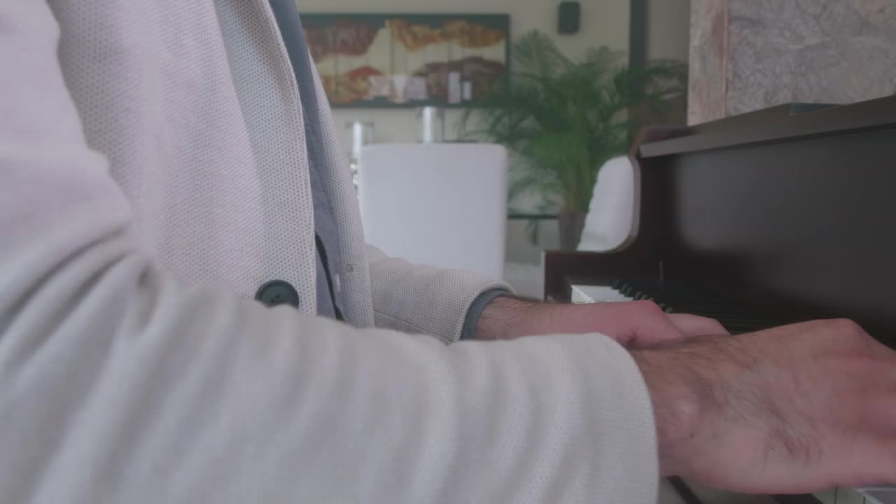 Free Video Stock Skilled Pianist Playing A Grand Piano In An Elegant Lobby Live Wallpaper - Free Download