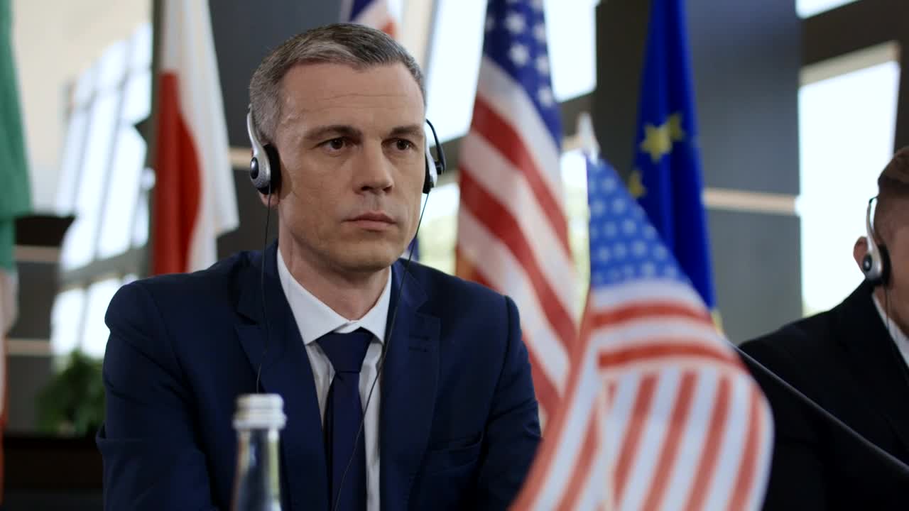 Video Stock Politician Listening To Translation Headphones Live Wallpaper Free - Free Download