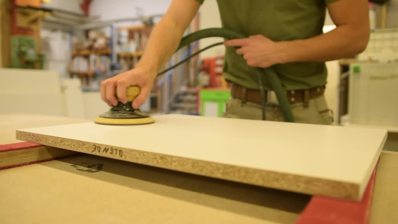 Video Stock Carpenter Sanding A Table Seen Close Live Wallpaper For PC - Free Download