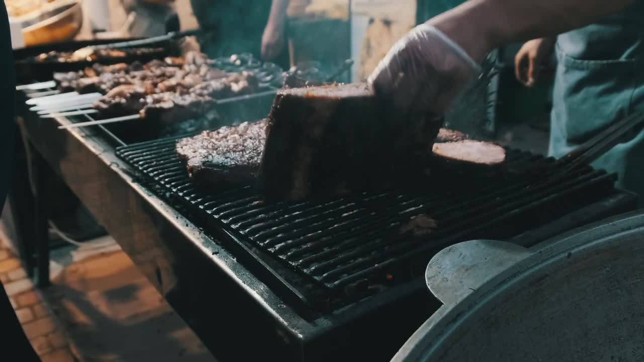 Stock Video Person Cooking Cuts Of Meat On The Grill Live Wallpaper - Free Download
