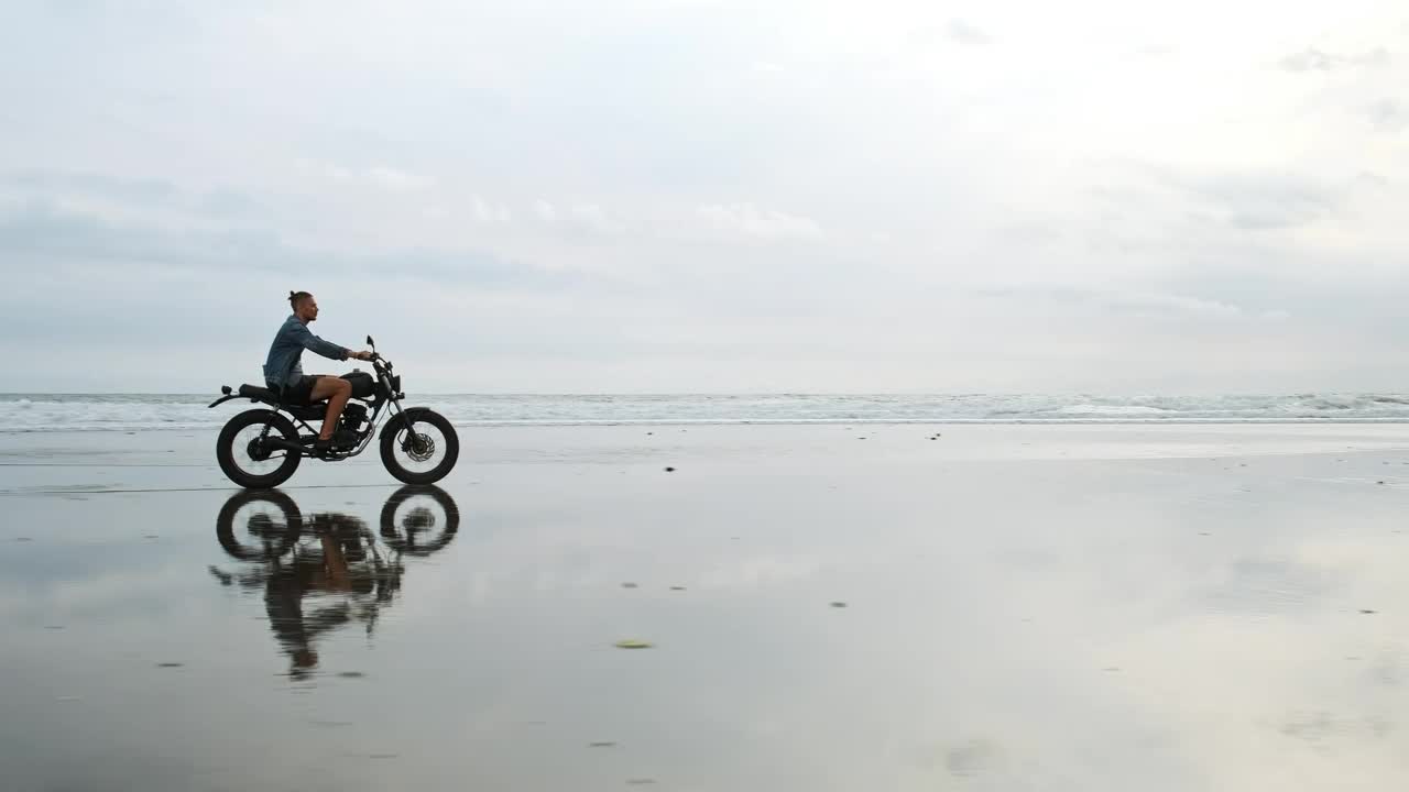 Stock Video Man On Motorcycle On The Seashor Animated Wallpaper - Free Download
