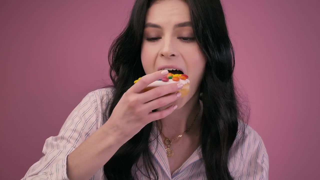 Stock Video Girl Eating A Glazed Donut With A Milkshake Live Wallpaper For PC - Free Download