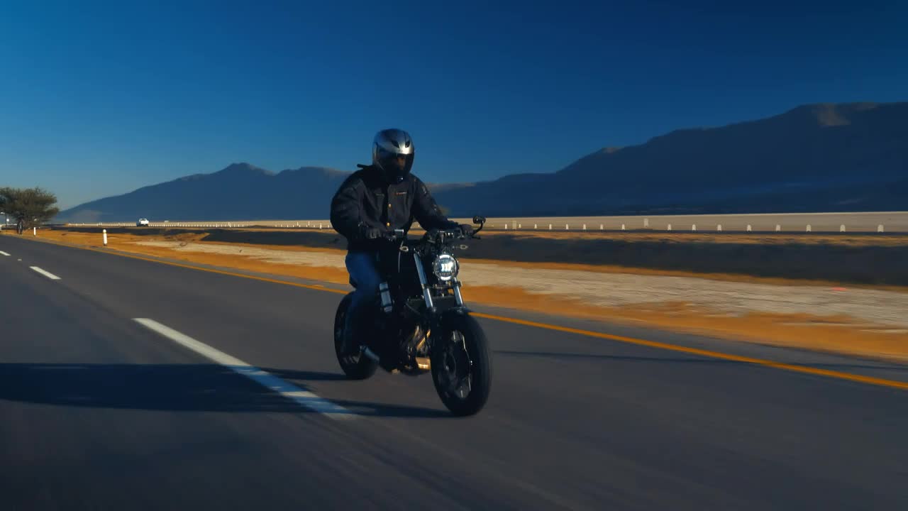 Stock Video Man Speeding A Road On A Motorcycl Animated Wallpaper - Free Download