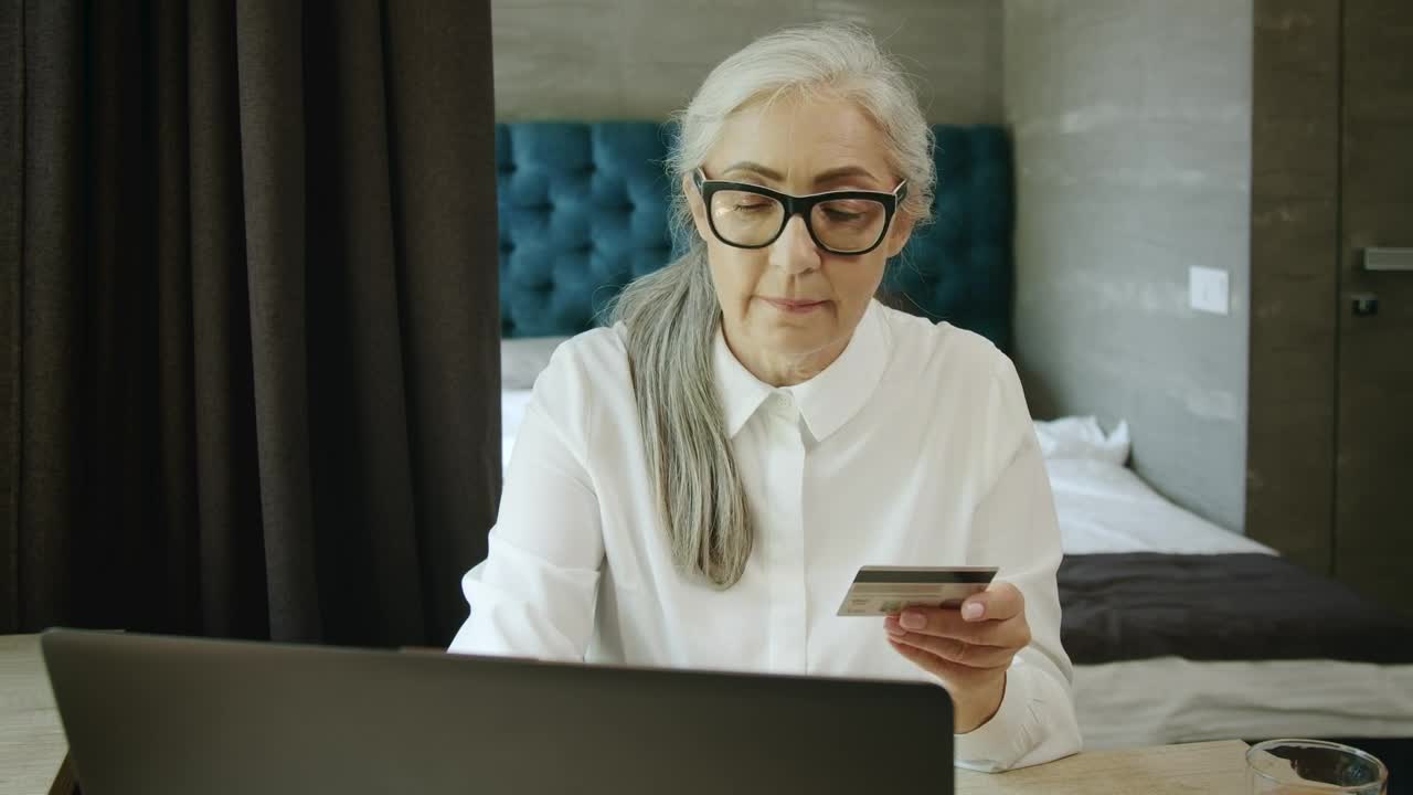 Stock Video Elderly Woman Online Shopping Uses Credit Card Payment Live Wallpaper For PC - Free Download