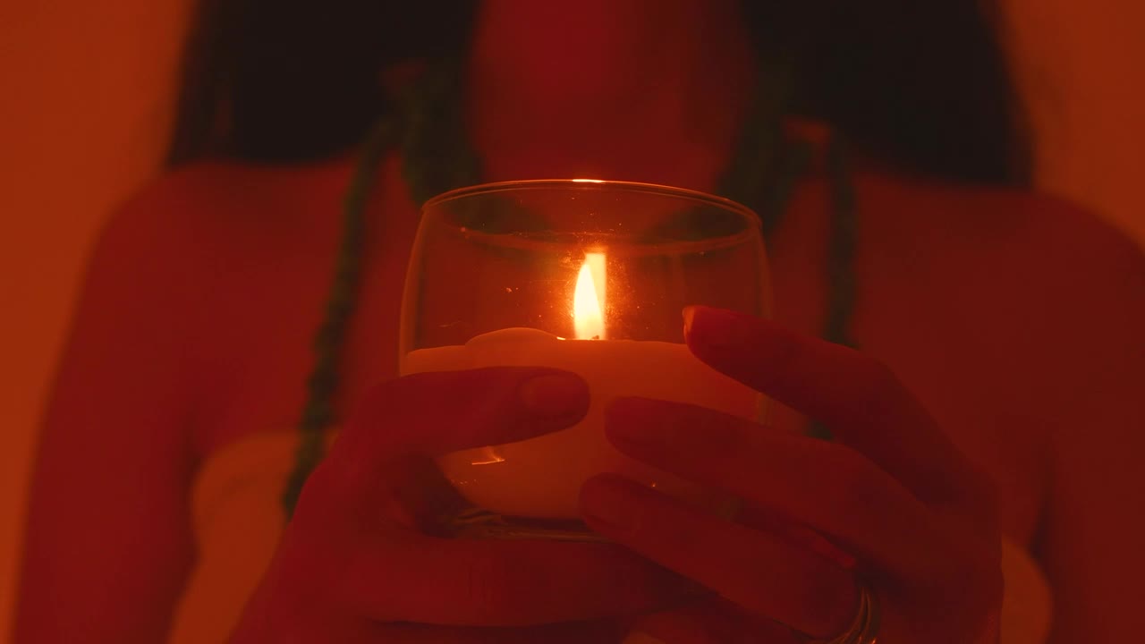 Free Video Stock Spiritual Girl Holding A Candle In Her Hands Live Wallpaper - Free Download