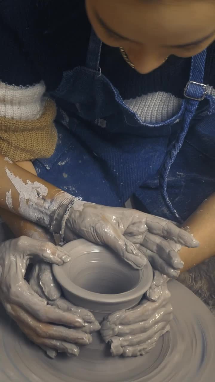 Stock Video Lgbtq Female Couple Modeling A Clay Vase Together Animated Wallpaper - Free Download
