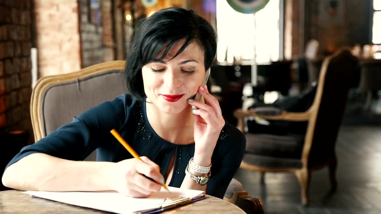 Free Video Stock Stylish Woman Talks On Mobile Phone In Vintage Cafe Live Wallpaper - Free Download