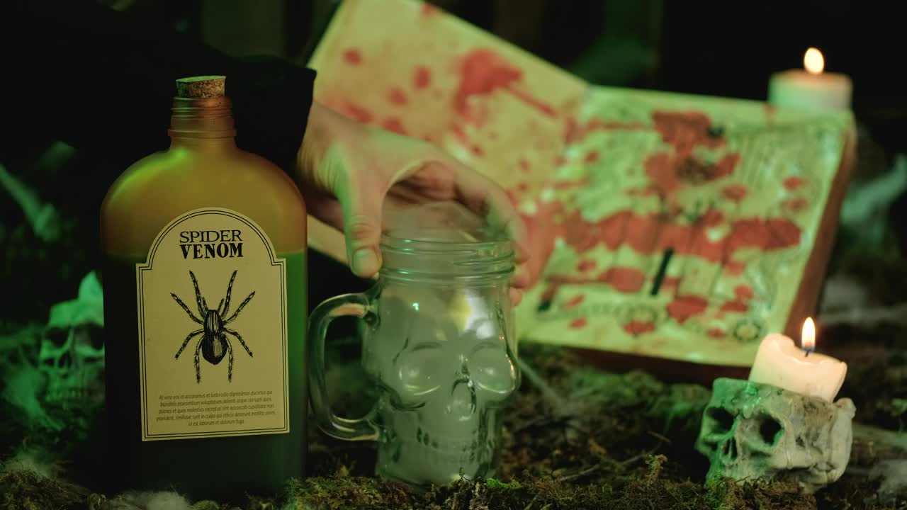 Stock Video Filling A Skull Shaped Glass With Spider Venom Live Wallpaper For PC - Free Download