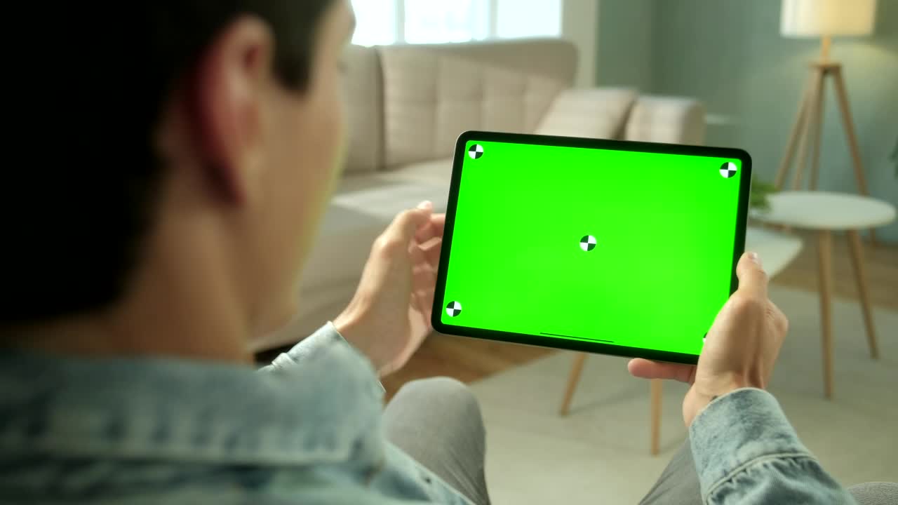 Stock Video Man Using Green Screen Tablet In Neutral Living Roo Animated Wallpaper - Free Download