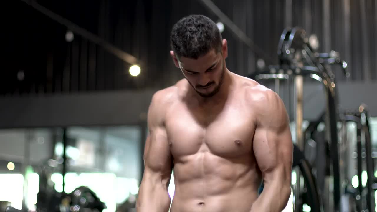 Stock Video Man Working Out With A Dumbbell In The Gy Animated Wallpaper - Free Download