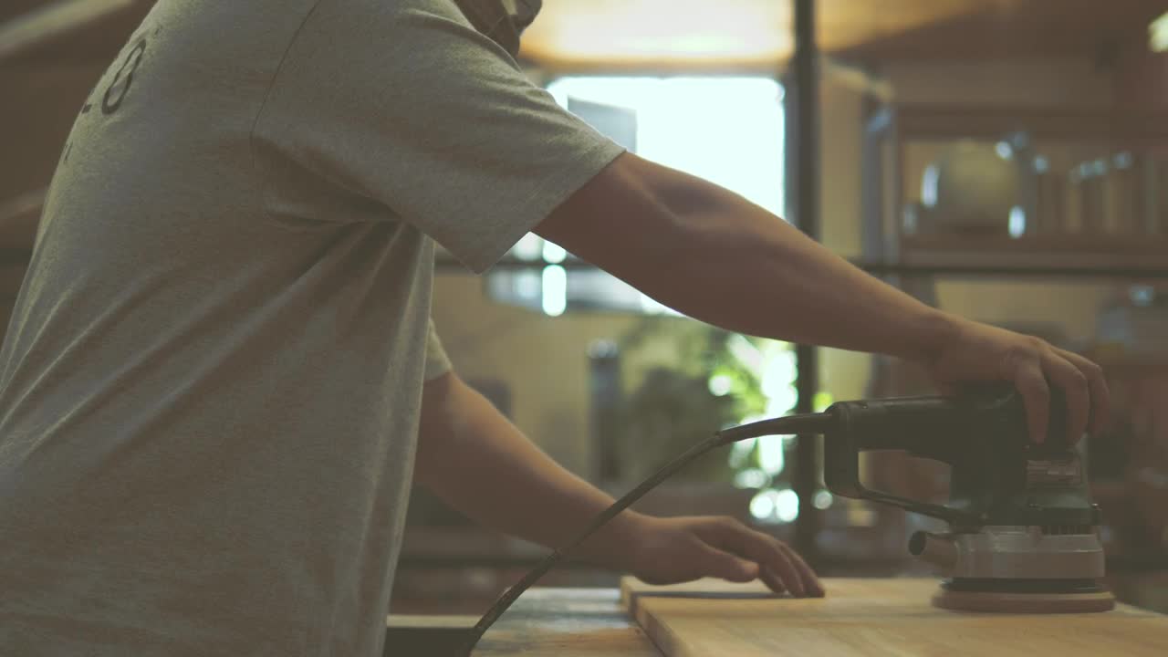 Video Stock Carpenter Sanding A Piece Of Lumber Live Wallpaper For PC - Free Download