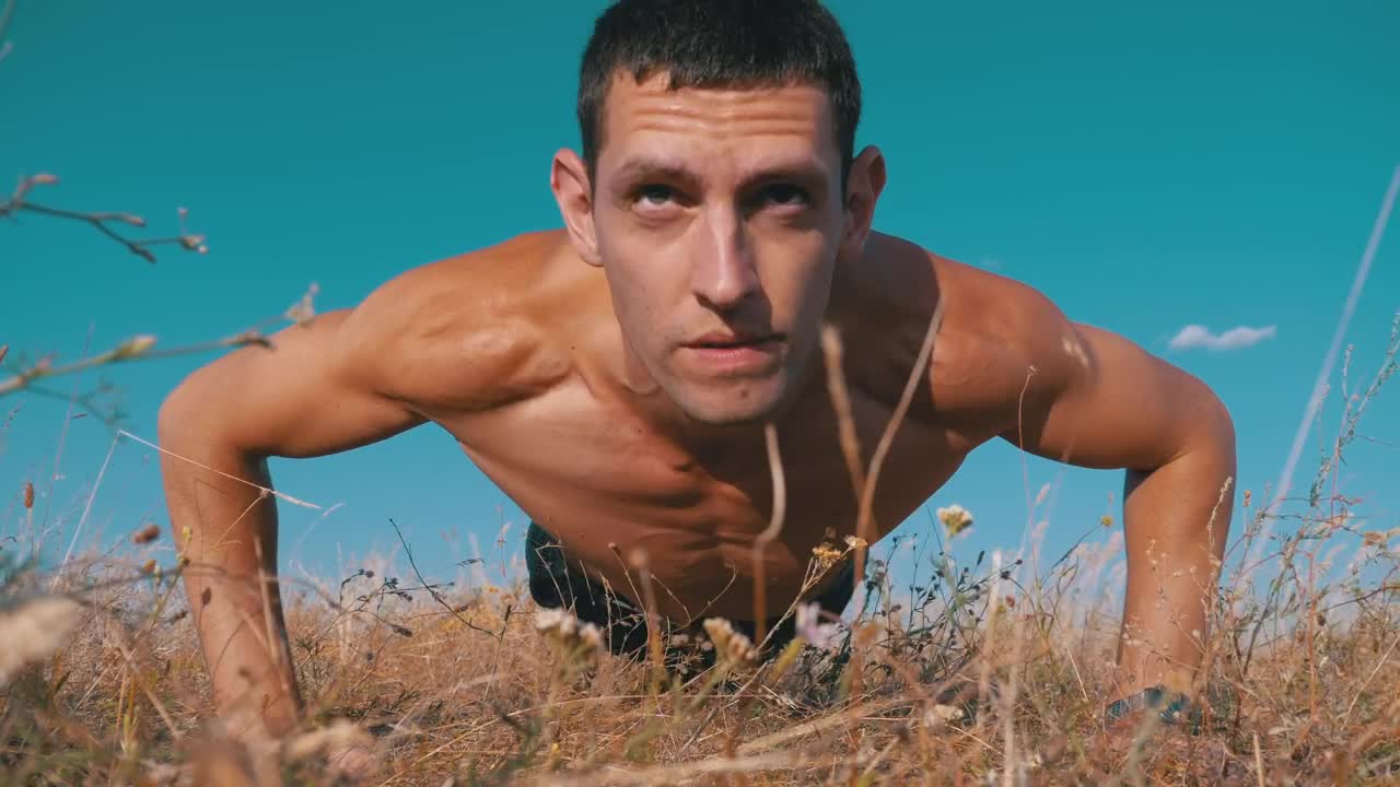 Free Video Stock Strongman Doing Push Outs Outdoors Live Wallpaper - Free Download
