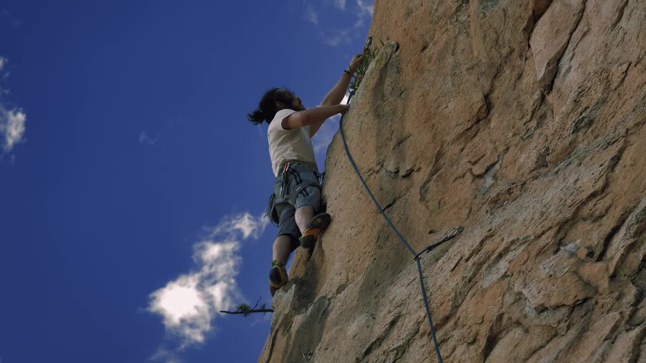 Stock Video Mountaineer Climbing On Top Of A Mountain Live Wallpaper - Free Download