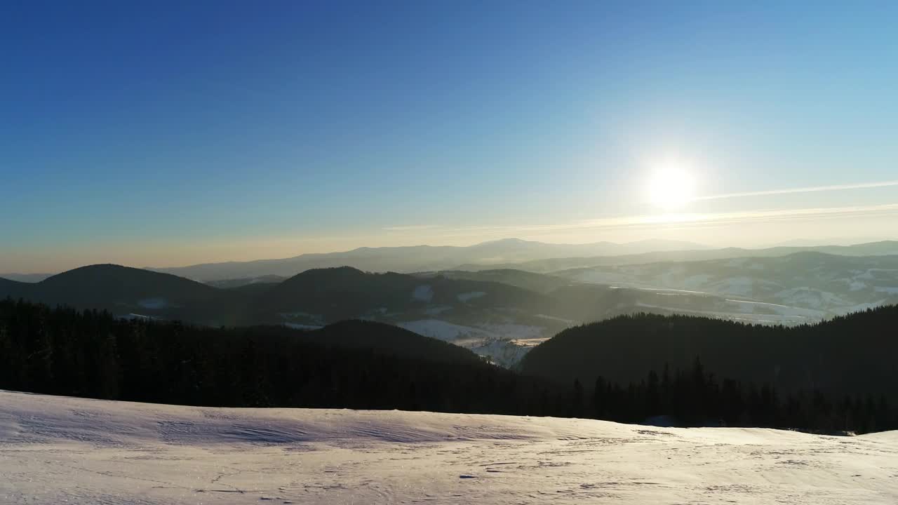 Free Video Stock sunrise seen from a snowy mountain Live Wallpaper - Free Download