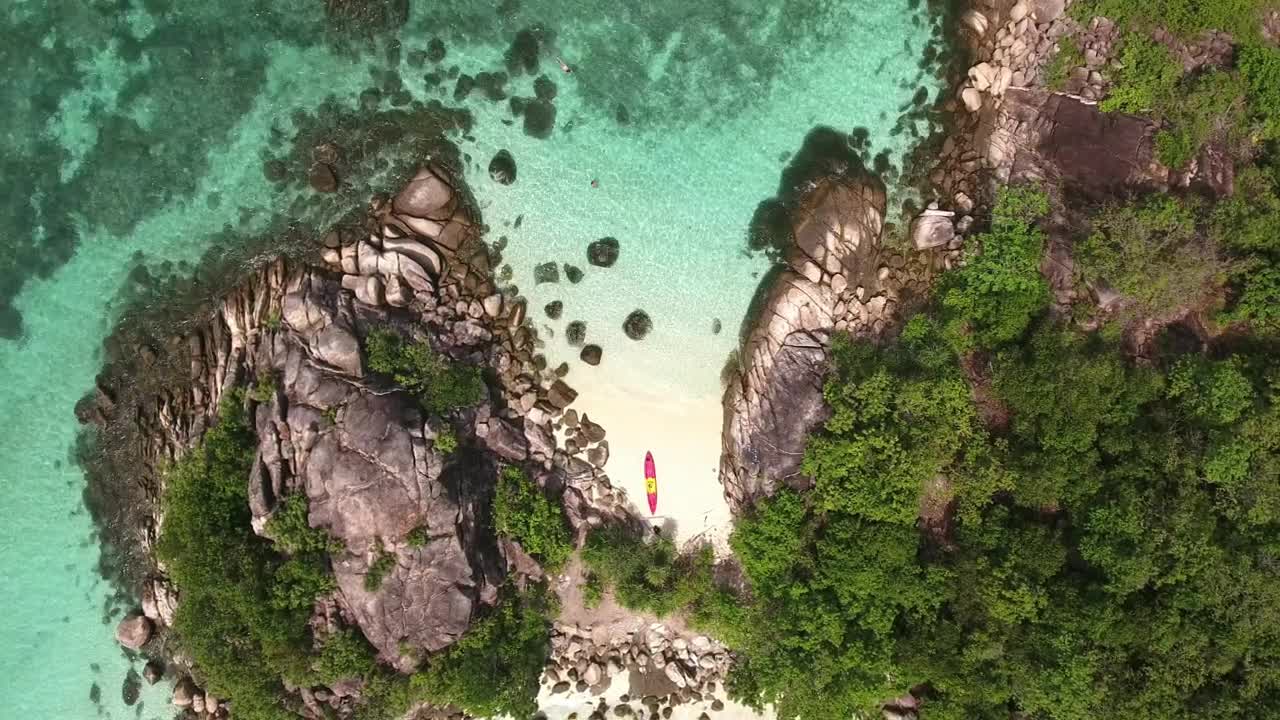 Free Video Stock top aerial shot of a small tropical island Live Wallpaper - Free Download