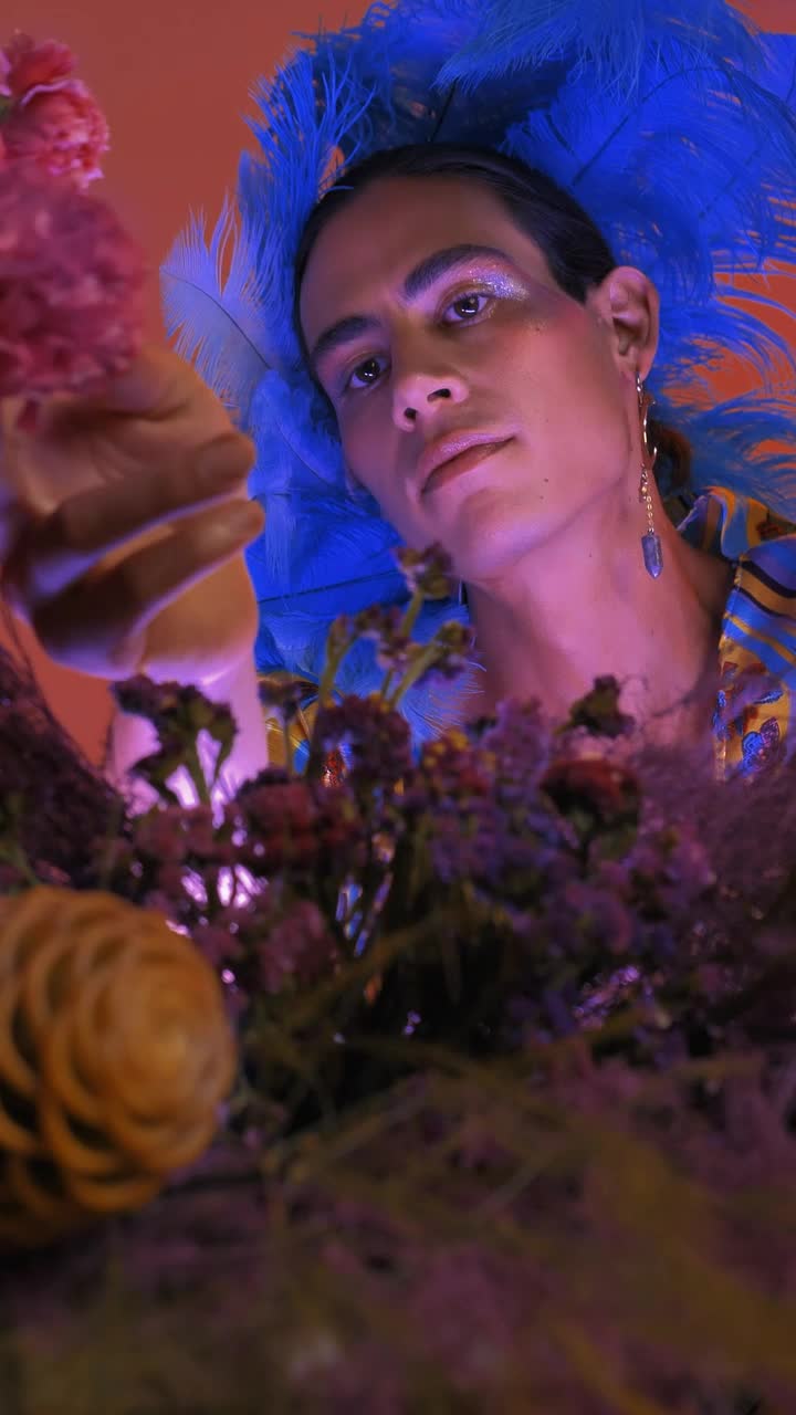 Stock Video Lgbtq Man Appreciating And Smelling Flowers Animated Wallpaper - Free Download