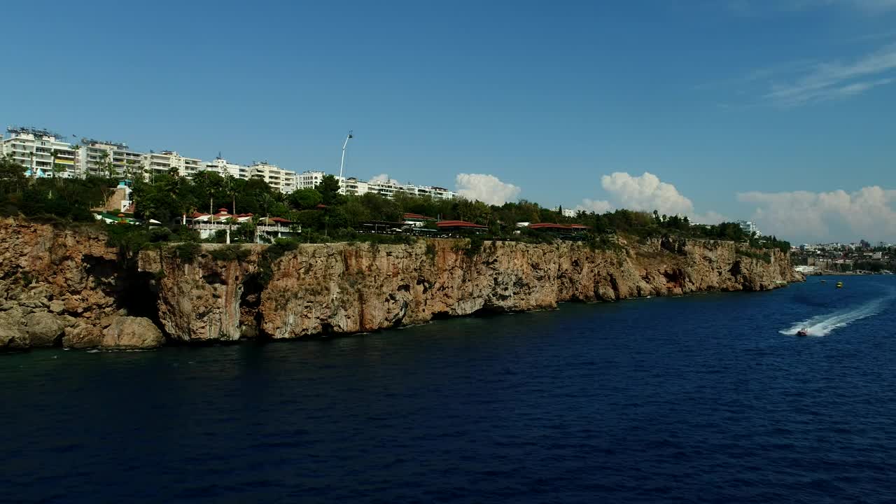 Stock Video Helicopter Racing A Boat Along The Coast Animated Wallpaper - Free Download