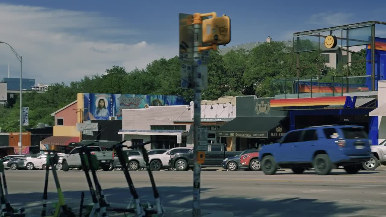 Free Video Stock Sunny Austin Texas Street With Many Businesses Live Wallpaper - Free Download