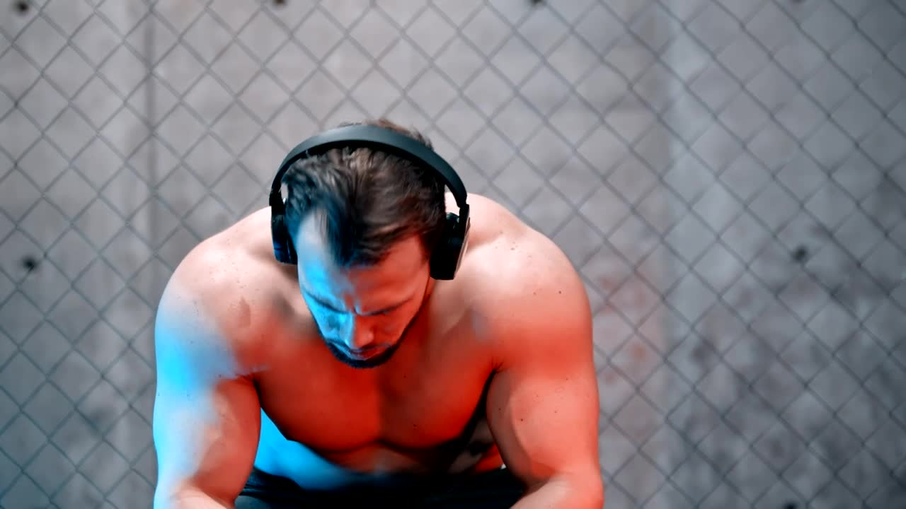 Stock Video Male Boxer Resting Sitting On A Bench At The Gym Animated Wallpaper - Free Download