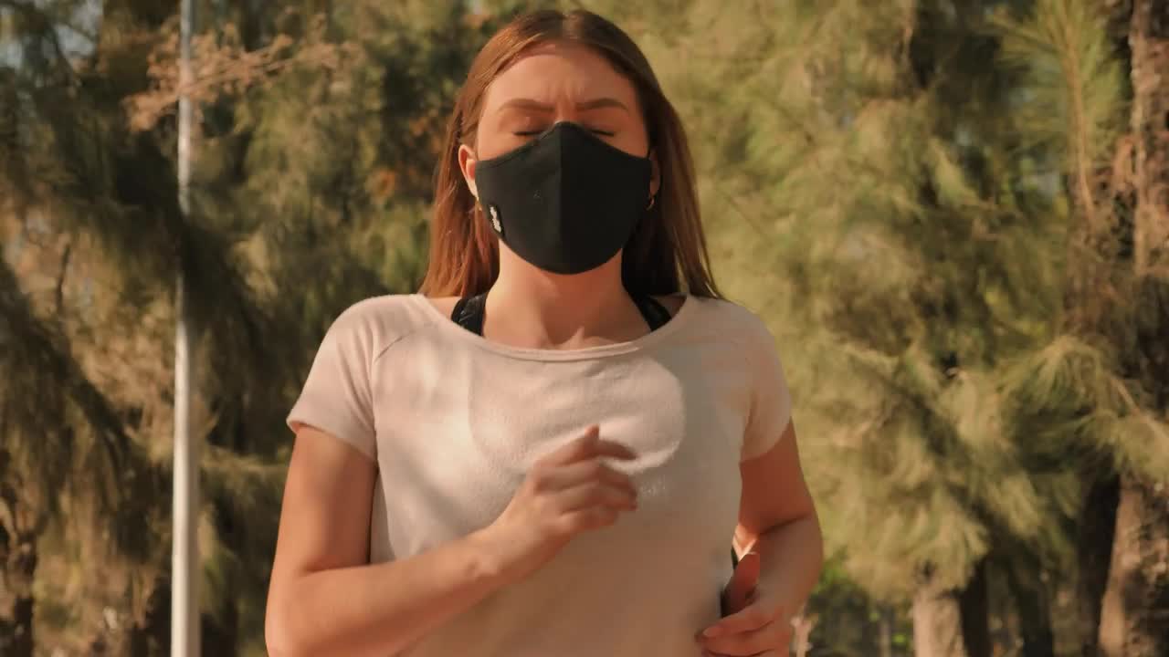 Free Stock Video Woman Wearing A Face Mask While Jogging Live Wallpaper - Free Download