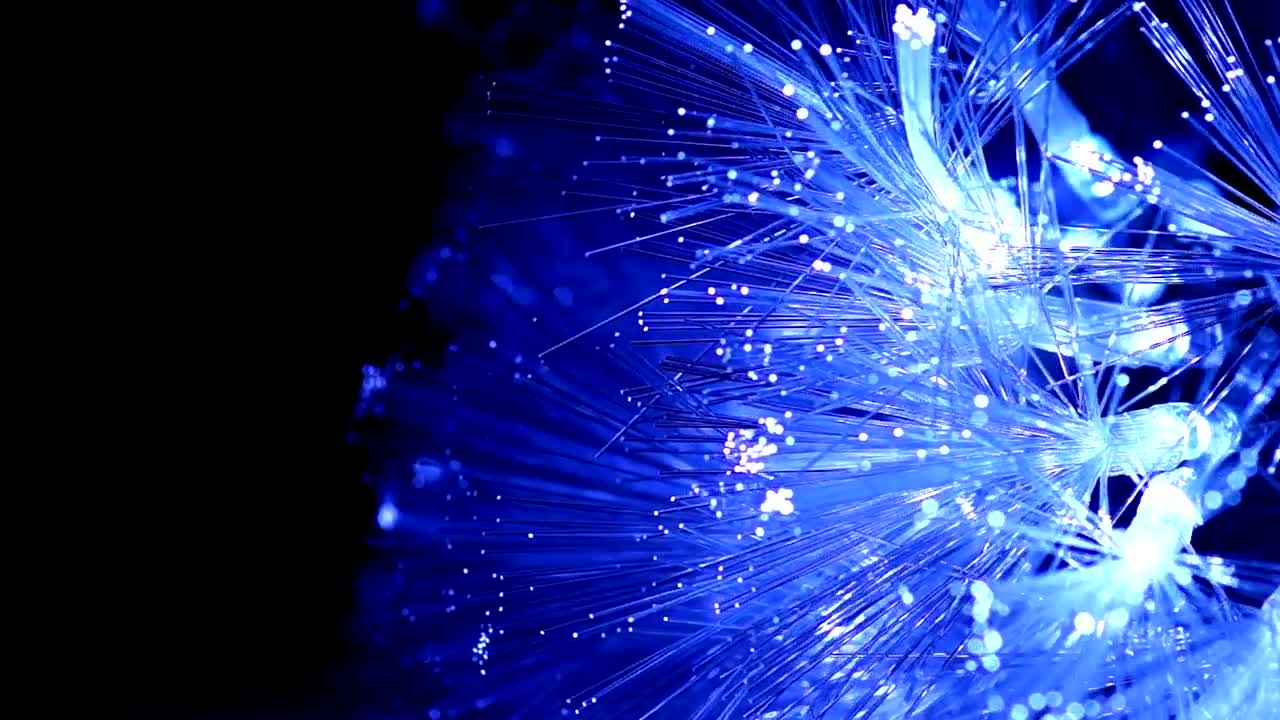 Stock Video Optic Fiber Glowing Blue In A Black Background Live Wallpaper - Free Download