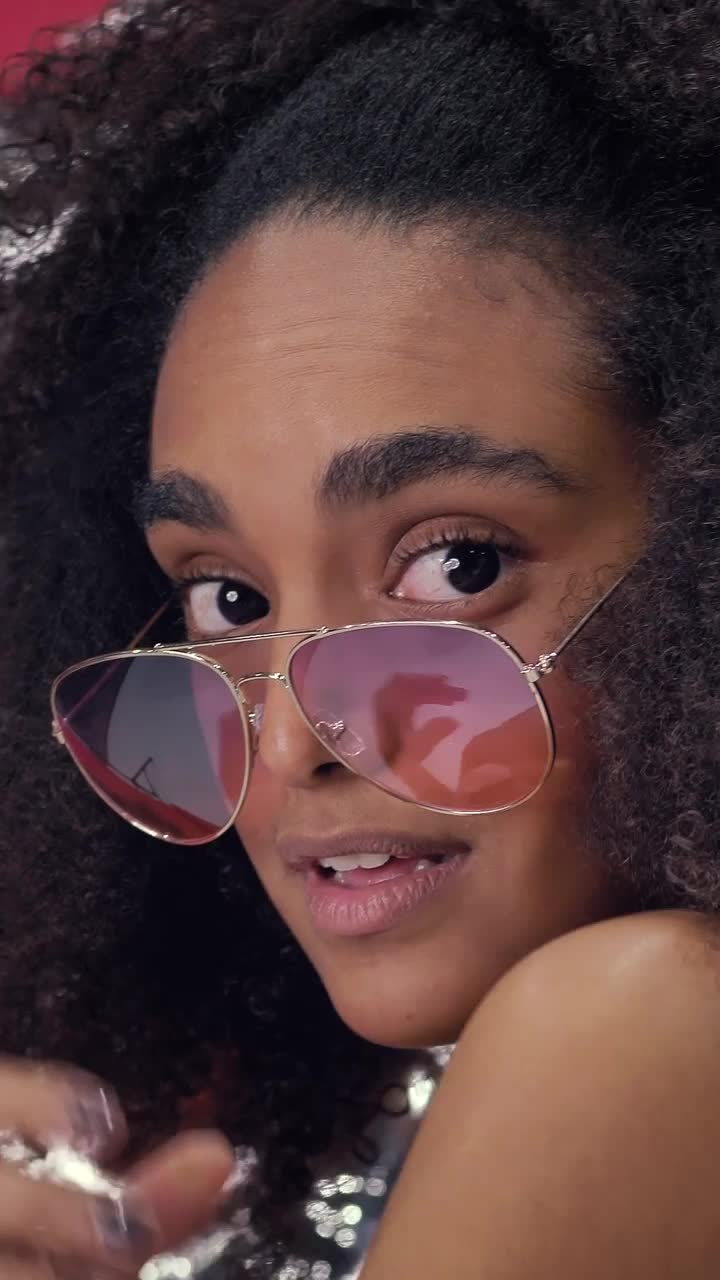 Video Stock Portrait Of A Captivating Young Woman Wearing Sunglasses Live Wallpaper Free - Free Download