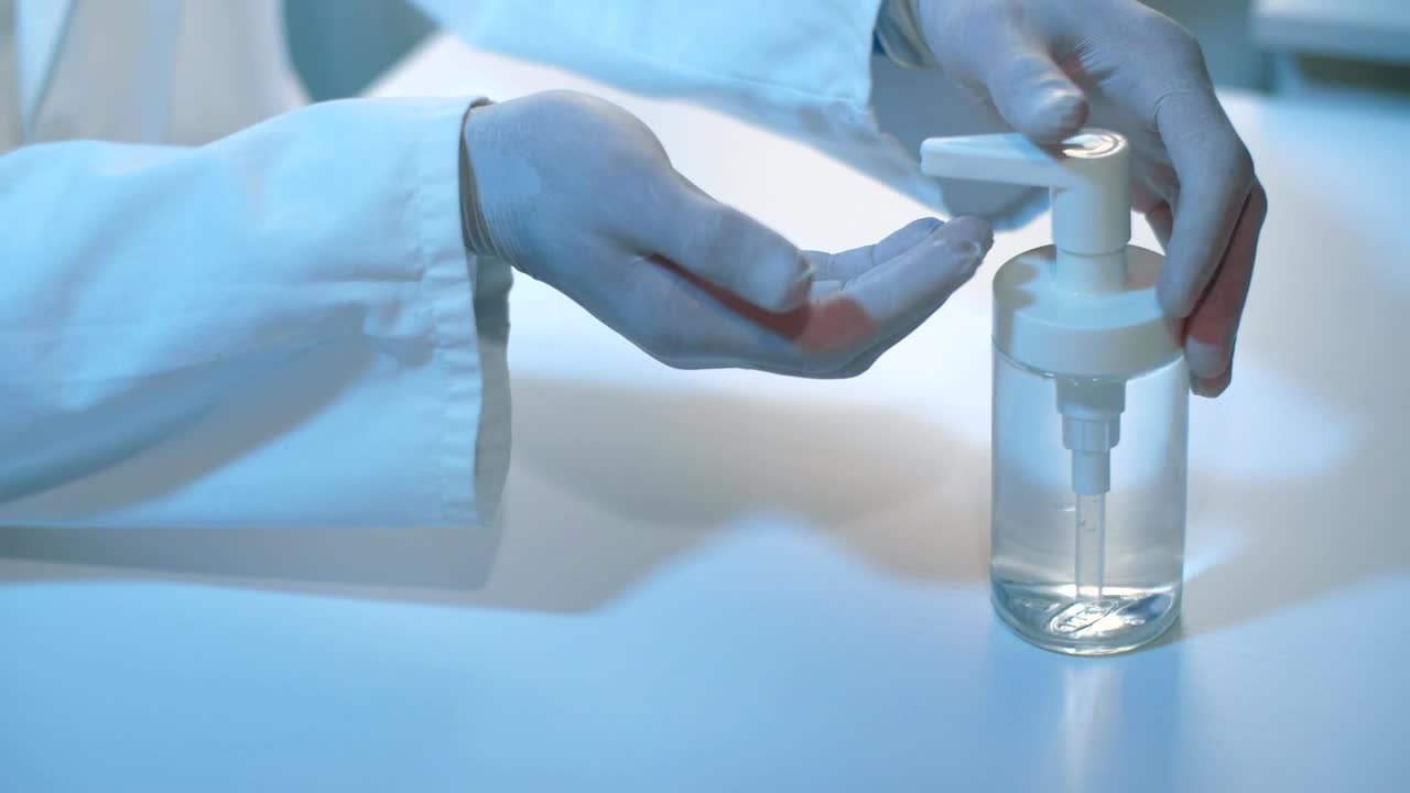 Stock Video Doctor Disinfecting His Surgical Gloves Live Wallpaper For PC - Free Download