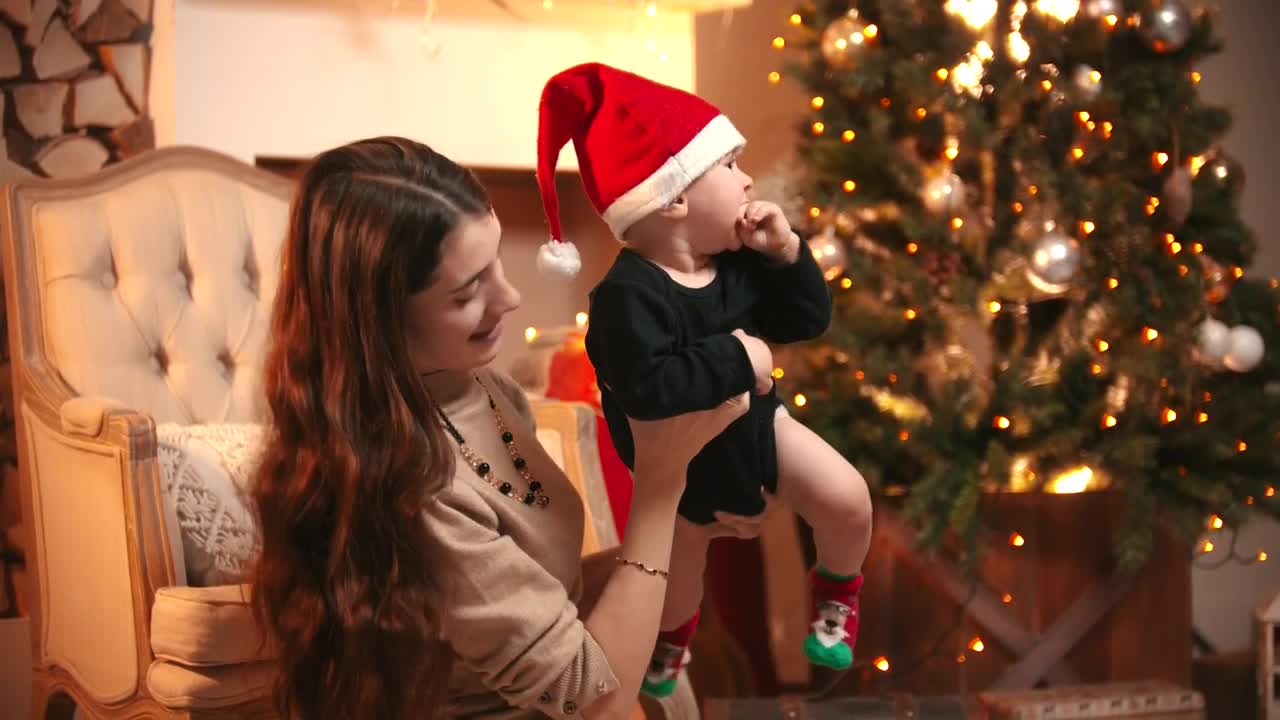 Stock Video Mother Appreciating Her Baby Holding Him In Her Arm Animated Wallpaper - Free Download