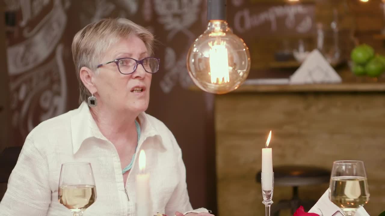 Stock Video Older Woman Has Difficult Romance On Dinner Date Live Wallpaper - Free Download