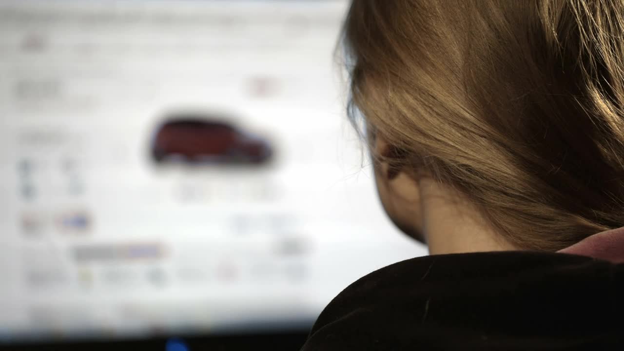 Stock Footage Woman Browsing Cars Online Live Wallpaper - Free Download