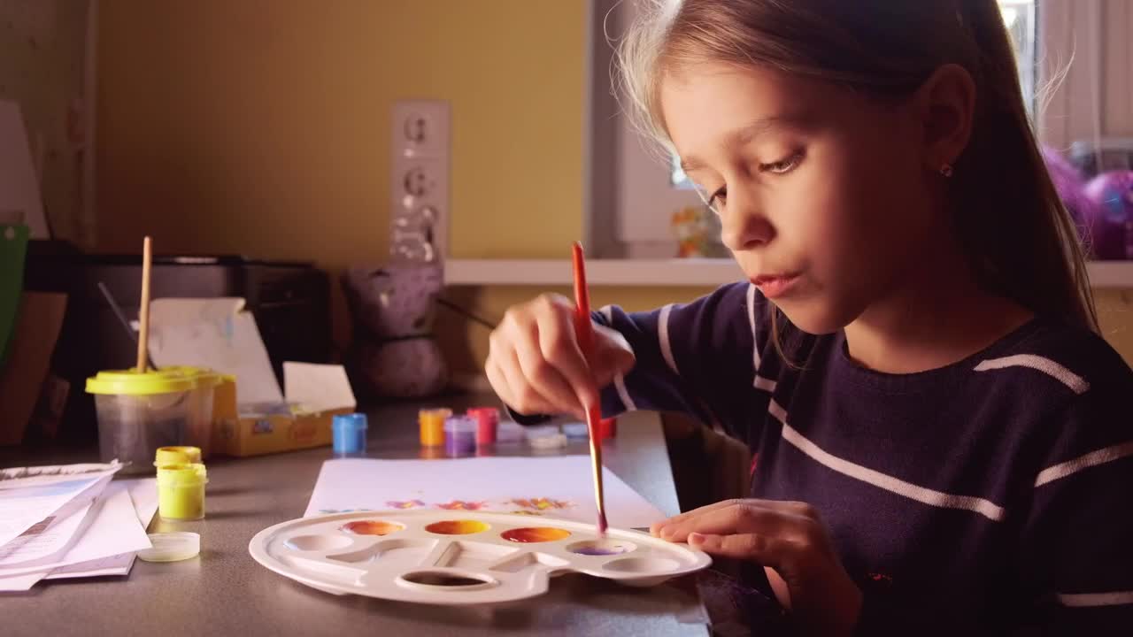 Stock Video Little Girl Painting With Watercolors At Home Animated Wallpaper - Free Download