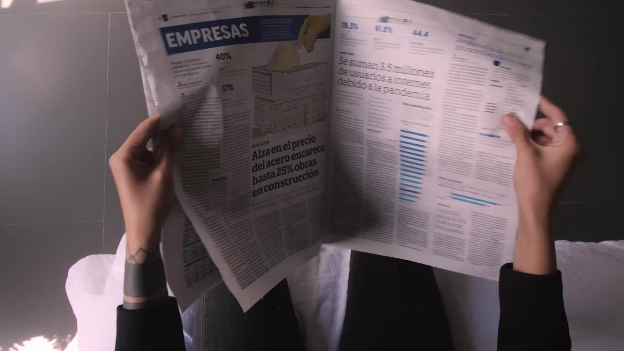 Video Stock Pov Flipping Through A Newspaper Live Wallpaper Free - Free Download