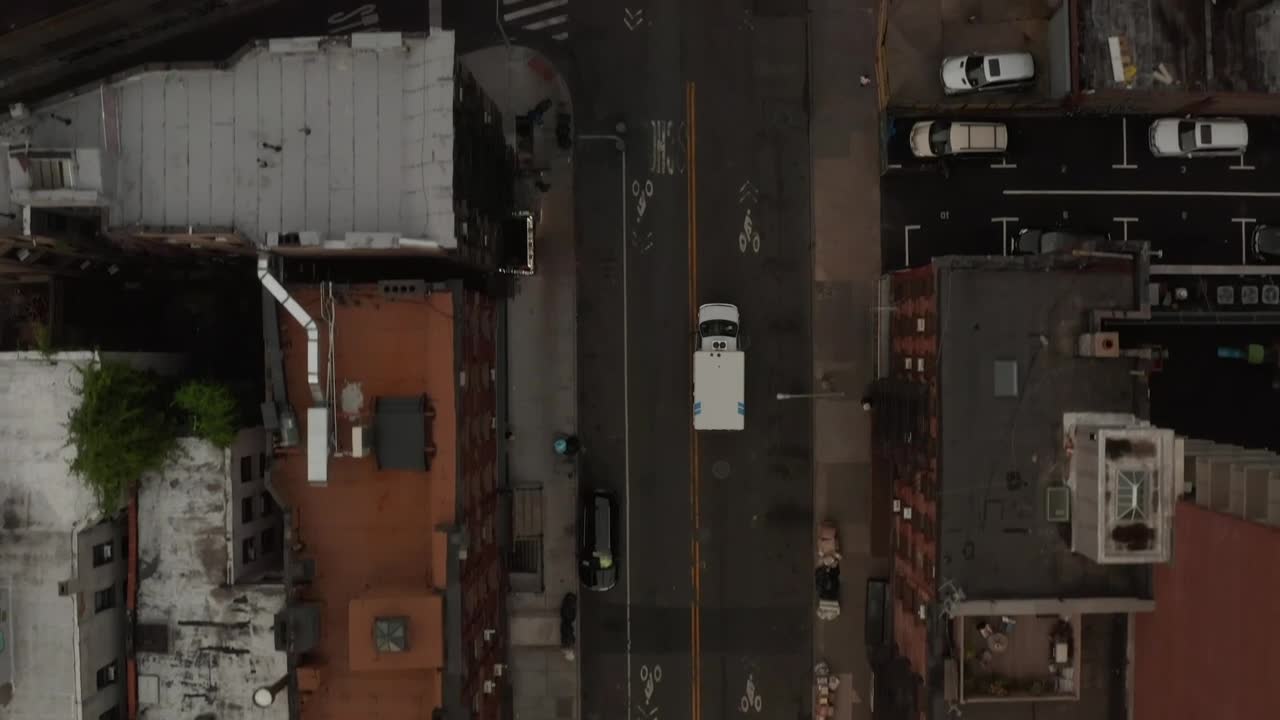 Free Video Stock top aerial tracking shot of an ambulance Live Wallpaper - Free Download