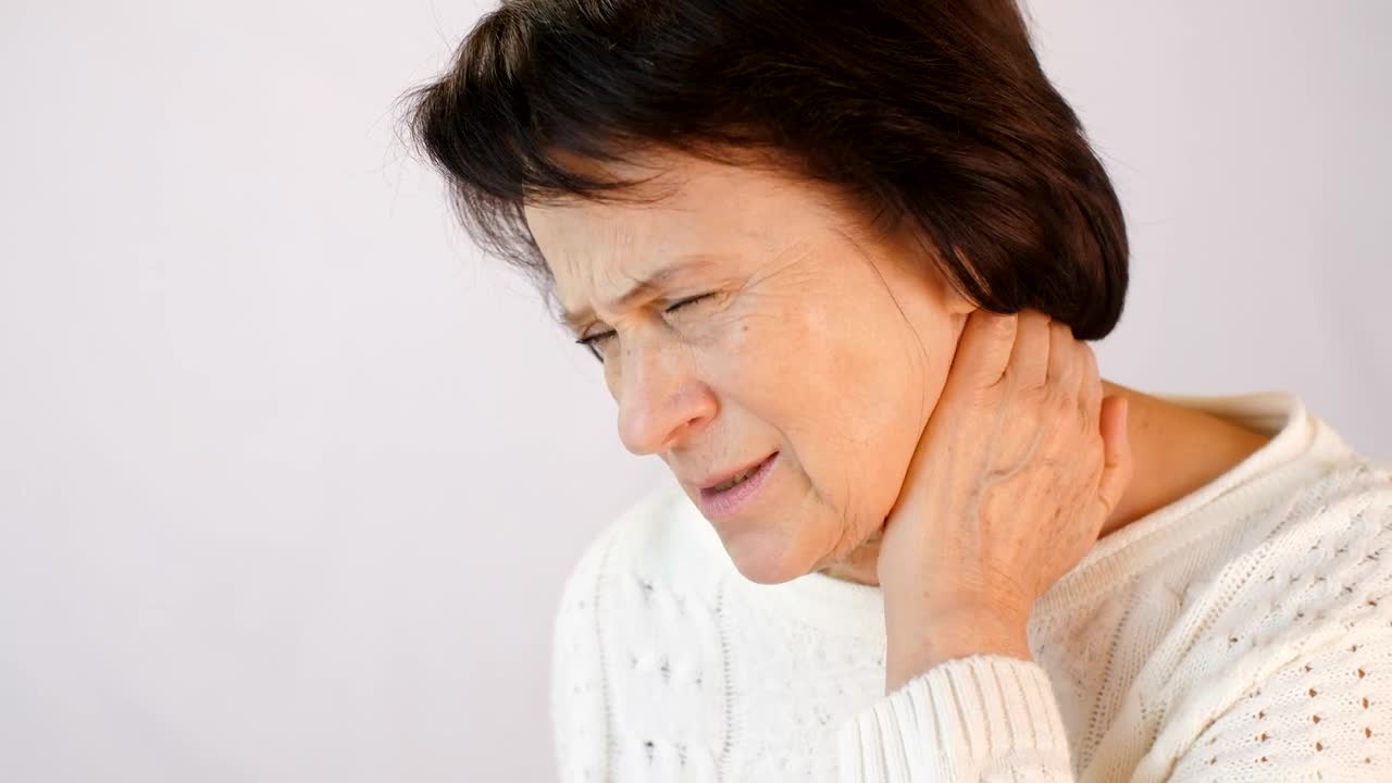 Stock Video Older Woman With Neck Tension Live Wallpaper - Free Download