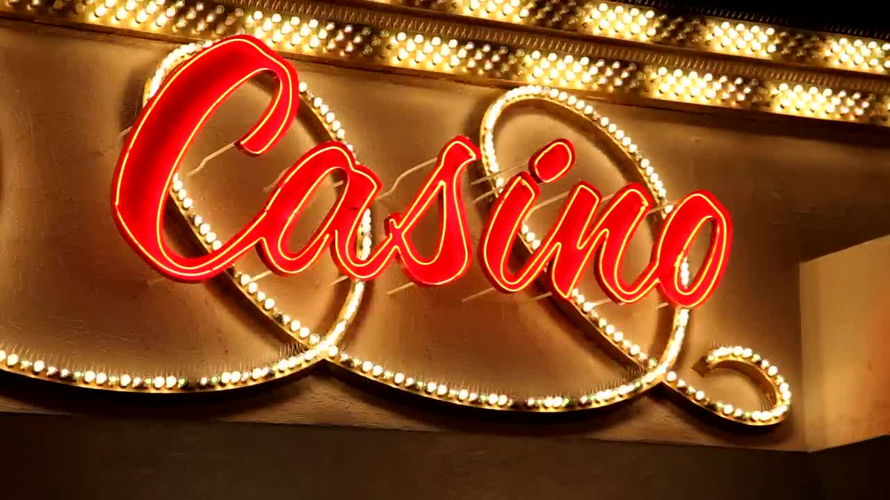 Stock Video Luminous Sign With The Word Casino Animated Wallpaper - Free Download