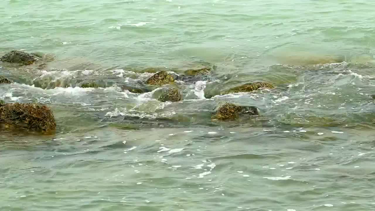 Video Stock Calm Waves Breaking Over Small Rocks Live Wallpaper For PC - Free Download