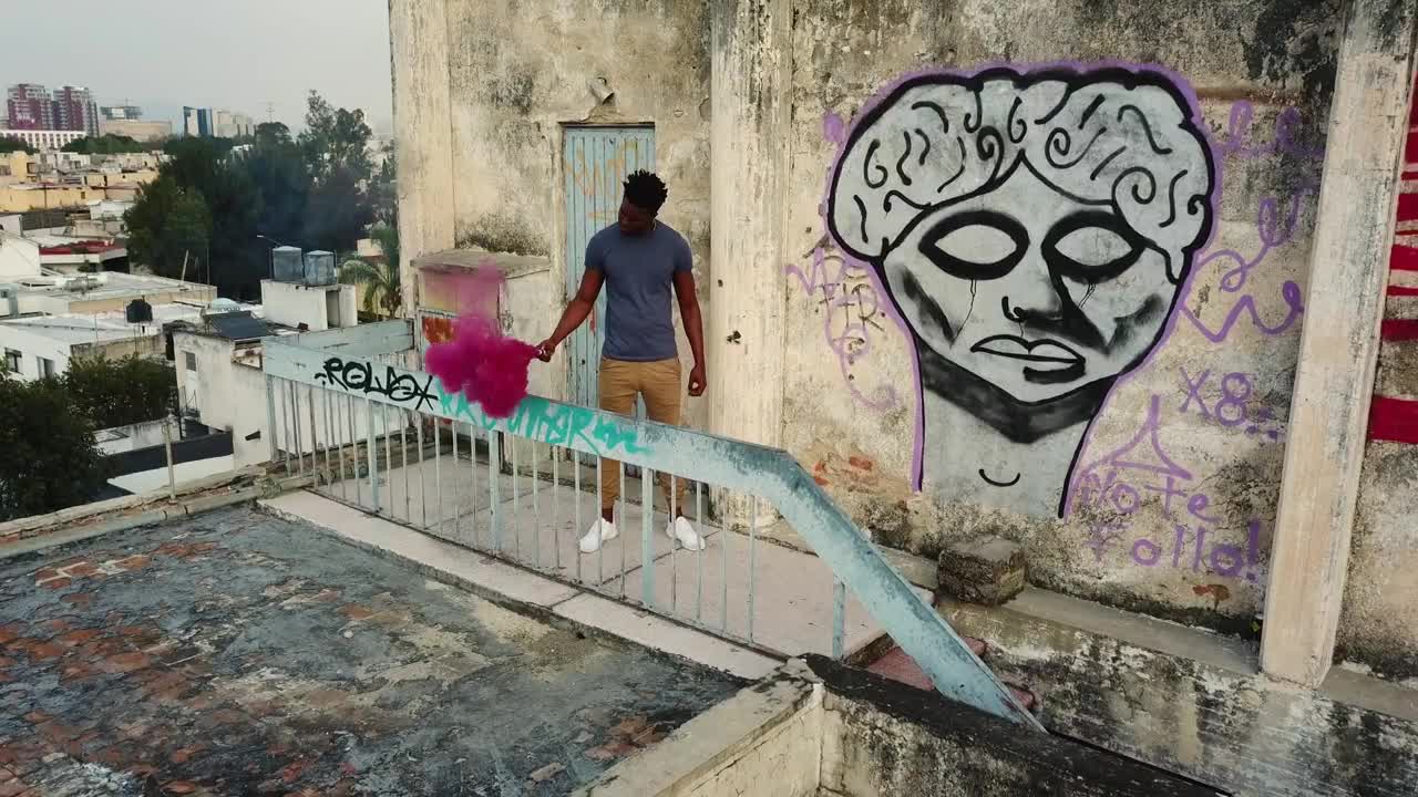 Stock Video Man On Rooftop With Smoke Bom Animated Wallpaper - Free Download