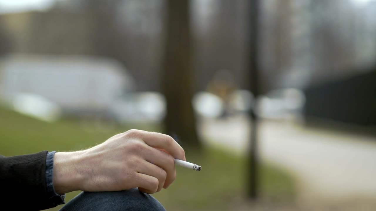 Stock Video Hand Holding A Cigarette Live Wallpaper For PC - Free Download