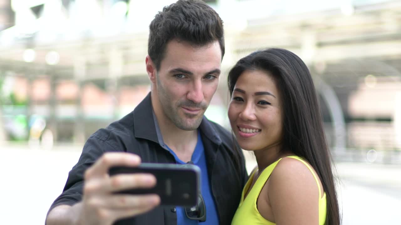 Stock Video Couple In Love Taking Selfies On The Street Live Wallpaper For PC - Free Download