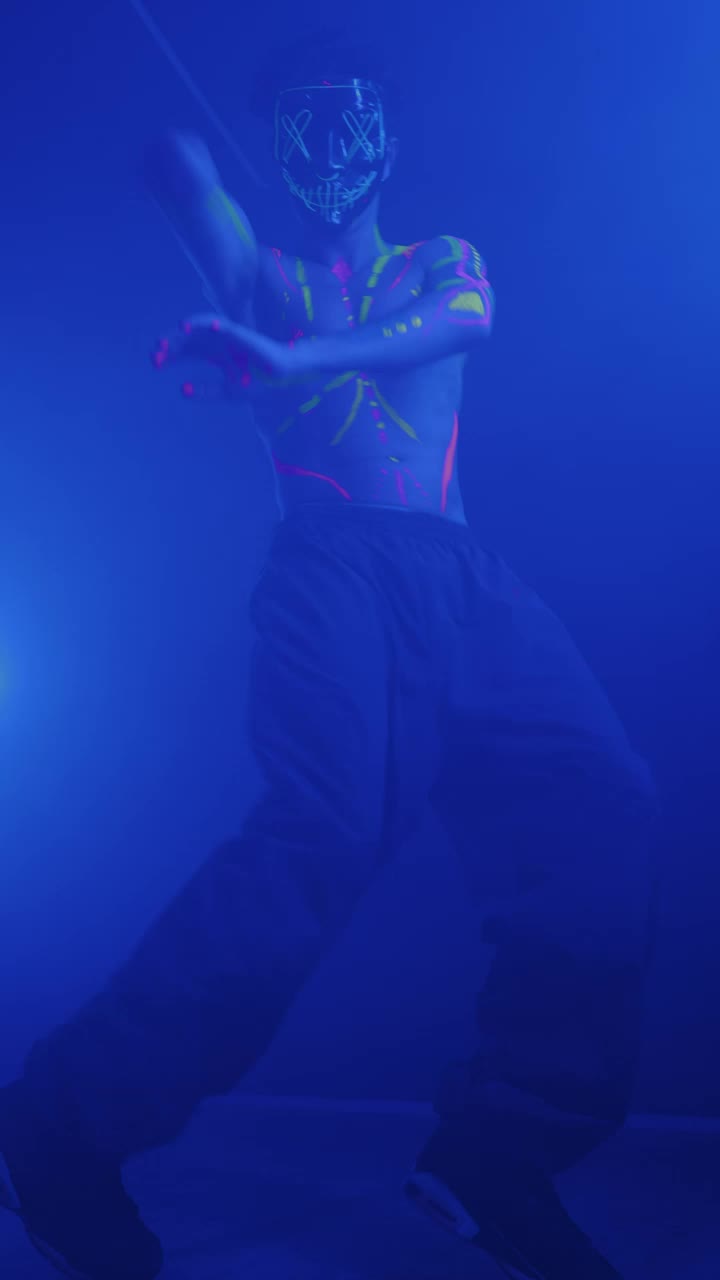 Free Video Stock Skillful Boy Dancing With A Mask With Lights Live Wallpaper - Free Download