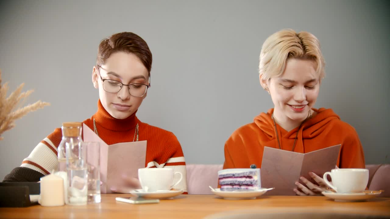 Stock Video Girls Reading The Menu At The Cafe Live Wallpaper For PC - Free Download