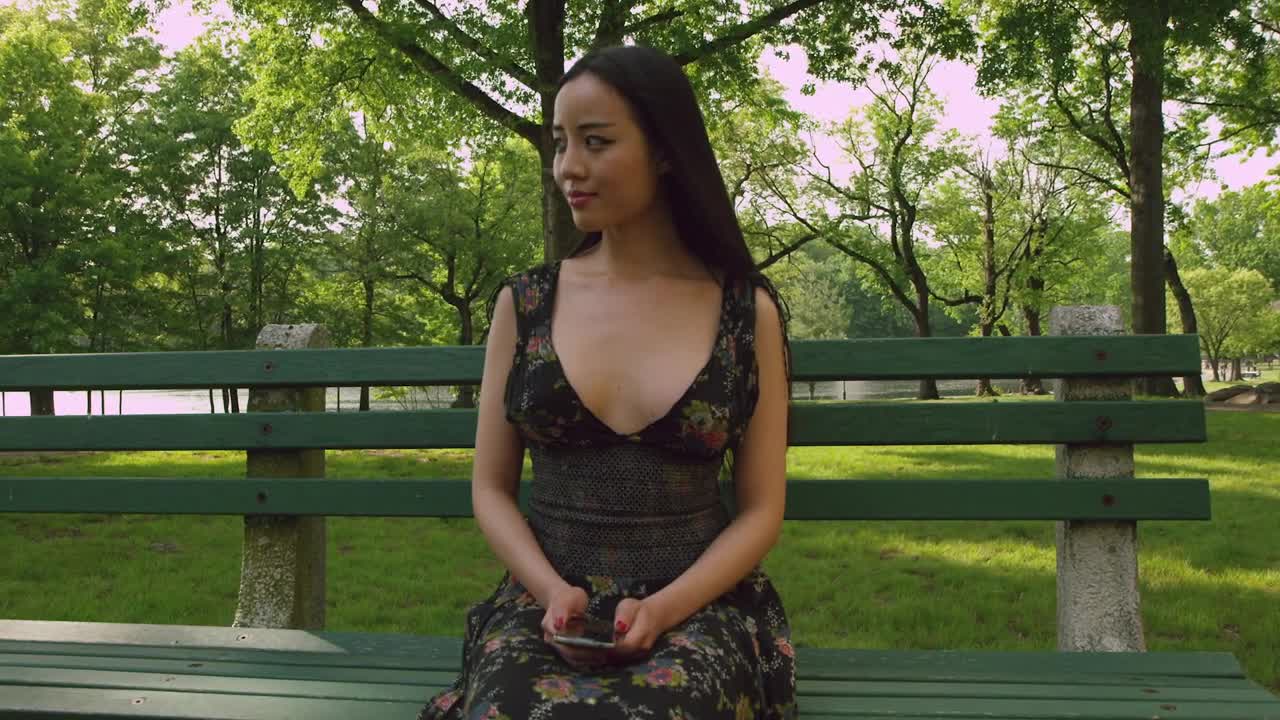 Free Video Stock texting from a park bench Live Wallpaper - Free Download