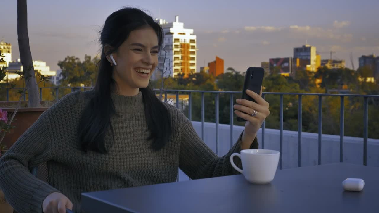 Stock Video Girl On A Terrace Having A Video Call Live Wallpaper For PC - Free Download
