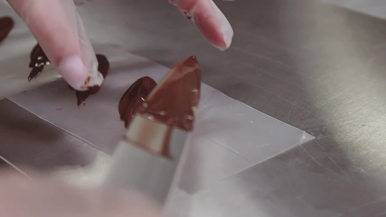 Stock Video Making Chocolate Shapes Animated Wallpaper - Free Download