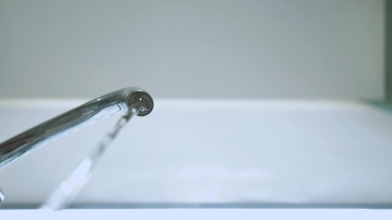 Free Video Stock tap turns on to pour water seen from below Live Wallpaper - Free Download