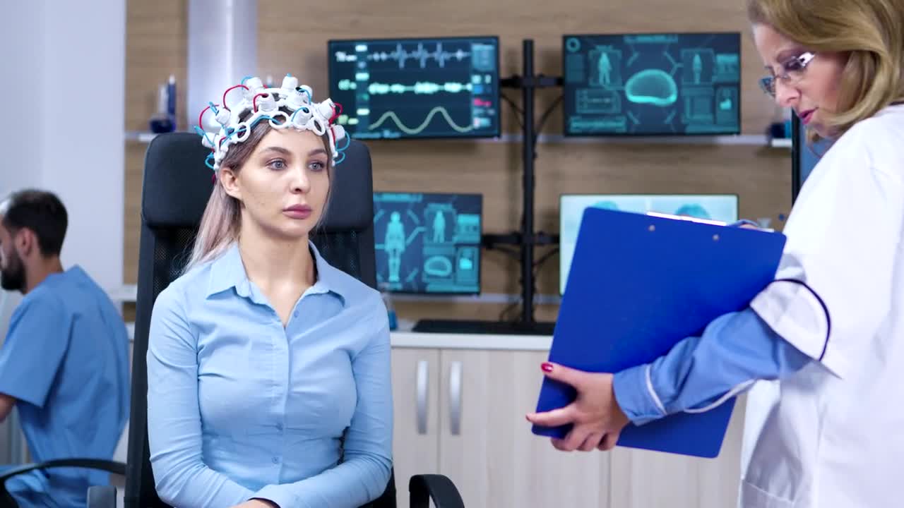 Stock Video Doctor Shows Results Of Brain Scan To Patient Live Wallpaper For PC - Free Download
