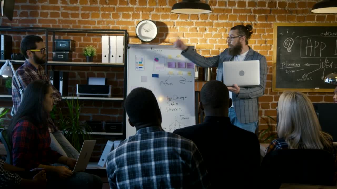 Stock Video Engineers Explaining The Project To The Audience Live Wallpaper For PC - Free Download
