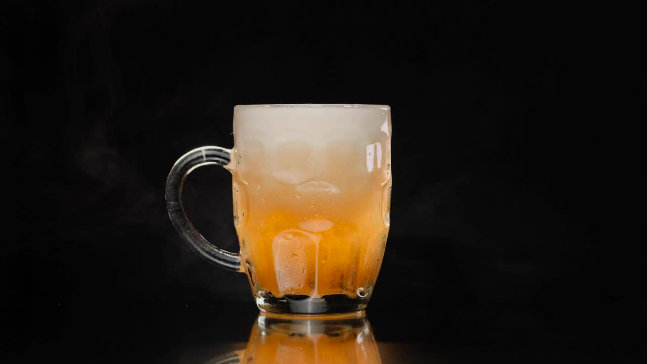 Video Stock Picking Up A Small Beer Mug On A Dark Background Live Wallpaper Free - Free Download